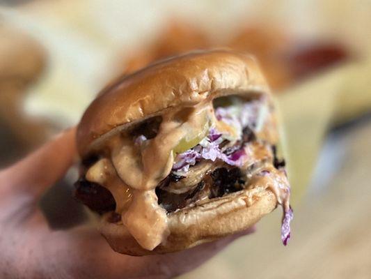 Spicy Memphis Chicken Sandwich w/ ranch slaw, aioli, and crunchy dill pickles.