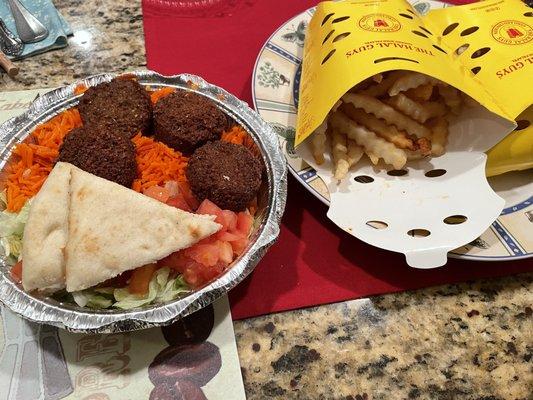 small falafel platter (sauces on the side) and crispy af fries