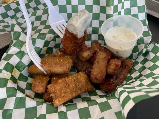 Tossed wings half Carolina Gold(Left), half BBQ(Right)