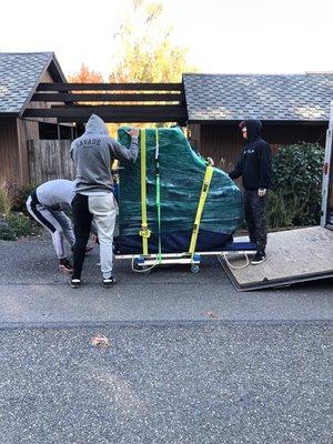 Baby Grand Piano the guys moved. Customer surprised his wife on her B-Day!