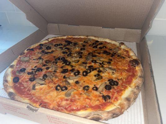 Vegan Pizza with olives and mushrooms