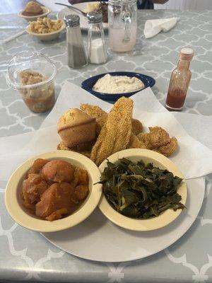 Catfish platter collars and sweet potatoes cornbread and peach cobbler.