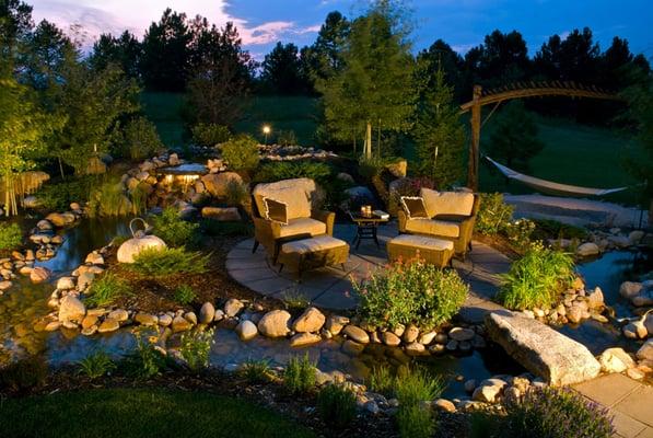 Patio, water feature, landscaping and outdoor lighting