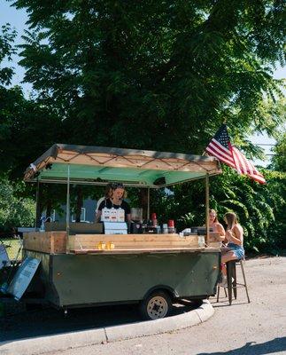 Our converted pop-up camper coffee trailer here to serve up a unique experience and tasty drinks!