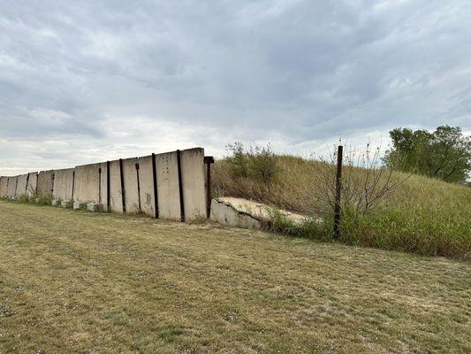 Barrier between the 100 and 50 yard ranges. Grassy hill is backstop for the 50 yard.