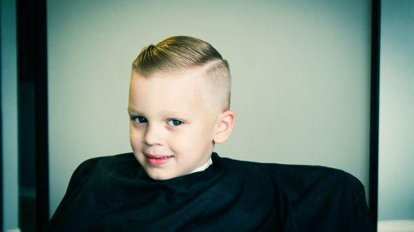 A classy style in a modern century on our little friend Max.  credits to Osman J. Gomez for such of outstanding haircut.