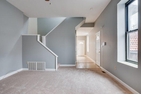 fresh paint and carpet to brighten up the spacious living room