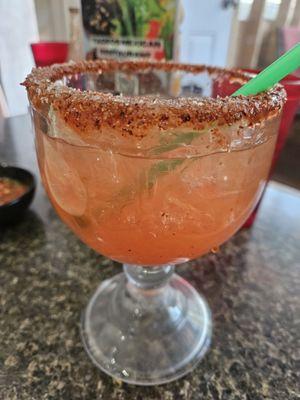 Watermelon margarita with silver tequila, chamoy and tajin rim. Soo good!