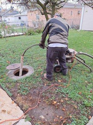 Nuzzo's guy Rodding out the main sewer line