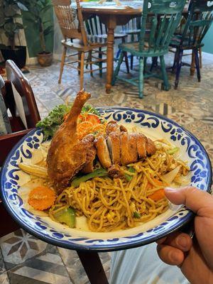 Fried duck with noodles.