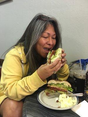 Sonja enjoy her deluxe sandwich at Fog City Java