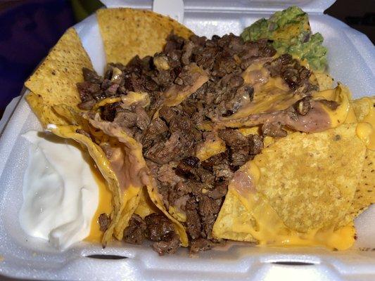 Nachos con Asada $9