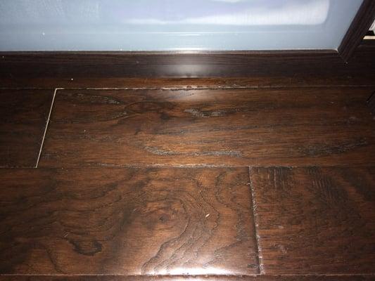 More gaps due to improper installation of my wood flooring by Joel and Chris P. of Texas Flooring Company in Apr2014.