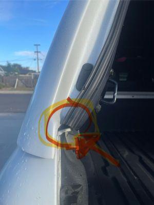 Both sides of the truck cap drain water straight into the truck bed because of the huge gap in the weather stripping.