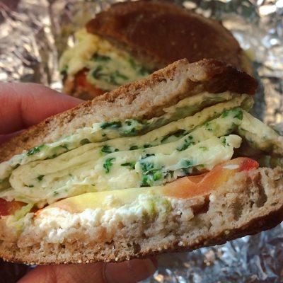 Spinach and Egg-white Omelette, Tomato, and Feta on a Whole Wheat English Muffin Breakfast Sandwich