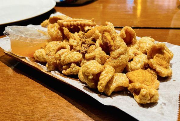 Chicharrón. I'll share a secret... crush this over your rice for that extra goodness