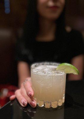 A beauty demos a classic craft margarita made with fresh squeezed limes and a custom syrup with Jalisco tequila ($16) 5/2023