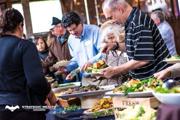 Clients enjoying a beautiful farm-to-table meal at a recent Wine & Wisdom in Louisville, KY!