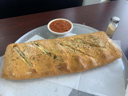 Large calzone w/ sausage and banana peppers