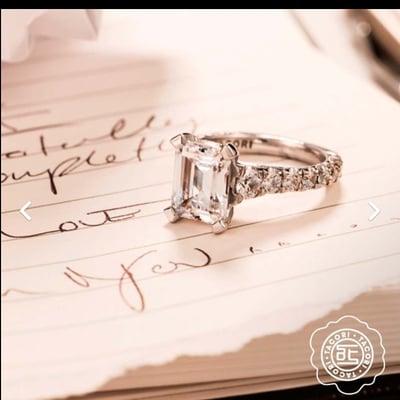 We carry Tacori and look how stunning this emerald cut engagement ring is?