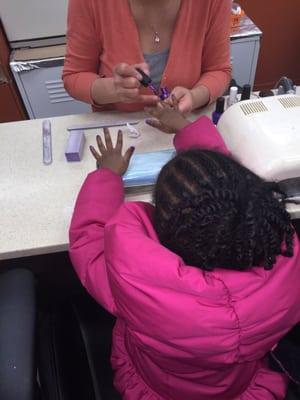 Babygirl getting a manicure