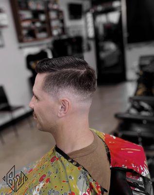 Mid skin fade with a gentleman haircut  #Mens Haircut #Fade Haircut #Mens Hairstylist #Fade