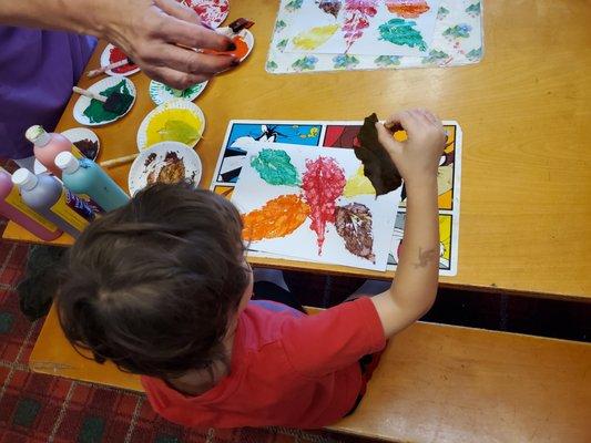 Stamping with fall leaves while learning about seasons and why leaves change colors. All projects are complete in small groups.