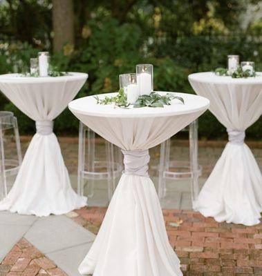 Cocktail tables and white linen