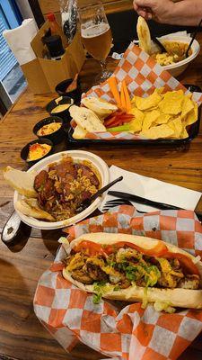 Blackened Shrimp Prim and Proper Po' Boy, Fred Beans and Rice w/ Andouille, Sampler Platter and Smothered Bowl w/Blackened Shrimp.