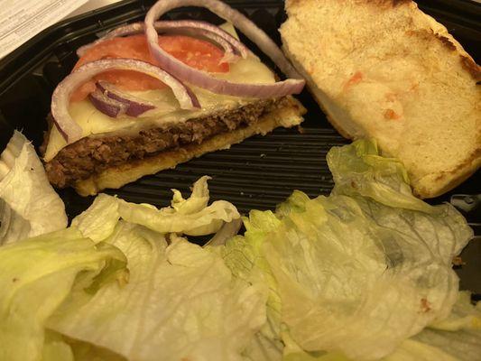 Nasty iceberg lettuce, tomatoes and onion instead of hatch green chile, and a thick patty instead of two smash patties as advertised.