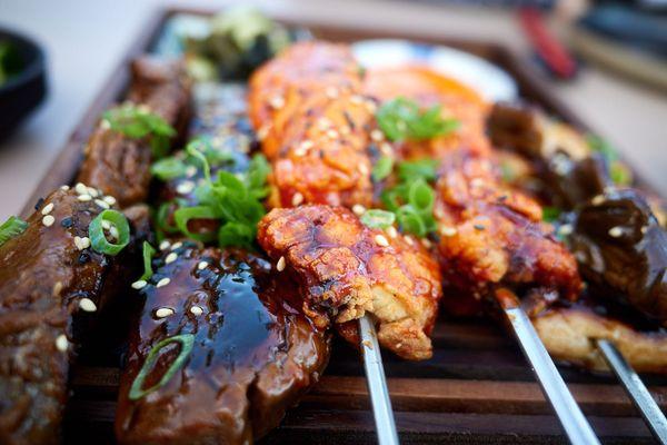 Yakitori trip (sticky sesame filet, crispy gochujang chicken, yuzu glazed ali'i mushrooms)