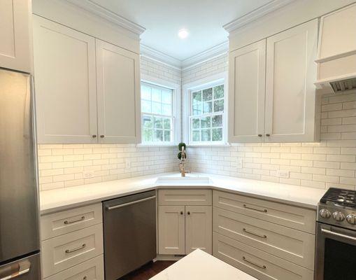 New Layout. New Cabinets. Quartz counters. New appliances and lighting. New floors and tile backsplash. Cary, NC