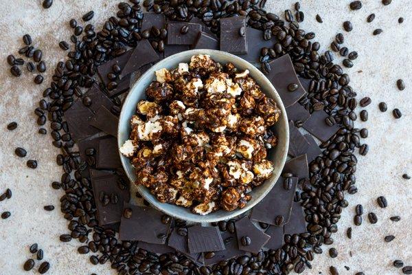 Dark Chocolate Espresso flavored popcorn, available in popcorn bags and tins!