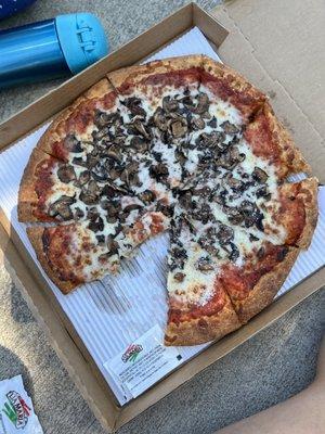 Large mushroom pizza, so goooood Tuesday special: large one topping for $14