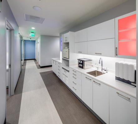 View of the hallway and sterilization center in the back