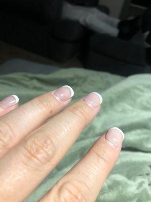 8 days after manicure. Peeling up, things getting caught under nails.