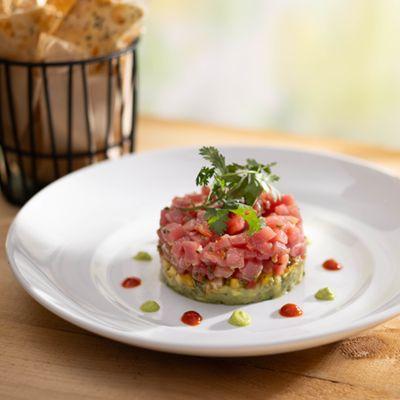 Ahi Tuna Tartare—handline tuna, avocado, tropical salsa, sriracha, wasabi