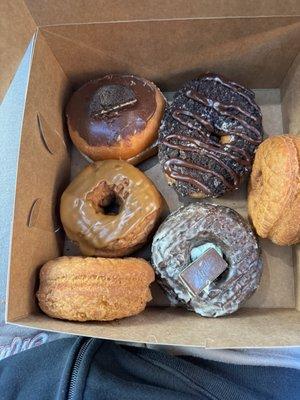 2 plain donuts, vanilla dipped Oreo, Andes mint, maple covered apple, and cookies and cream.