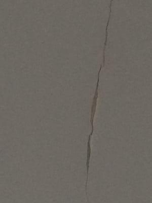 the ever-growing crack in our bathroom ceiling due to a lack of ventilation