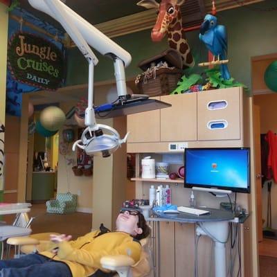 Yearly visit to the dentist. He's watching "Napoleon Dynamite".