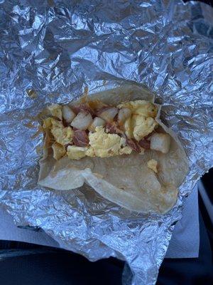 Potato, egg and cheese breakfast taco