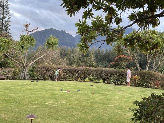 Grassy area with games. Nice place to hang while waiting for a table.