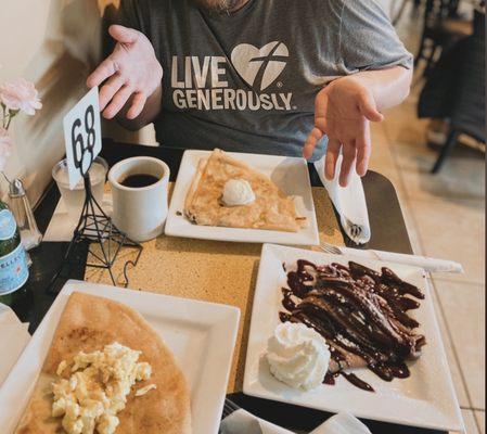 Chocolate raspberry mousse dessert crepe and vegetarian crepe as well as bacon and egg crepe.