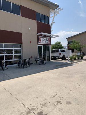 Parking lot view with outdoor patio