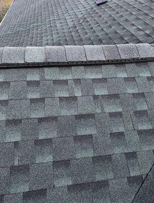 Ridge vent and ridge cap shingles in hunter green