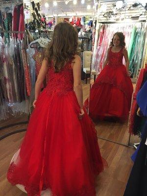 First time trying on her amazing dress at Bebe's!