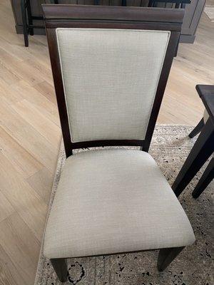 Six reupholstered dining chairs.