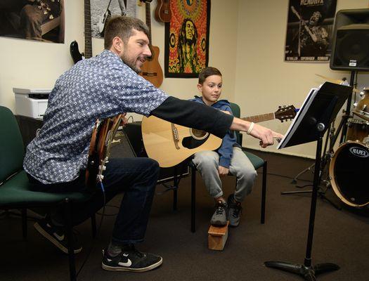 George helping Lucas work on a Christmas song