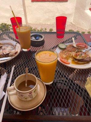 Coffee, eggs Benedict, mango smoothies