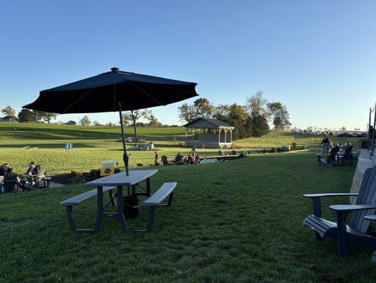 Outside over the fire pits and the field